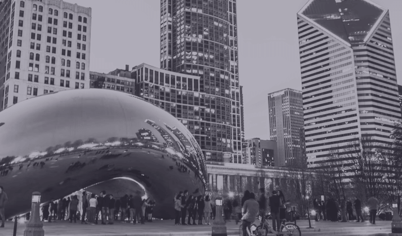 CloudMasonry Salesforce Consulting - Background Image - Cloud Gate sculpture in Chicago cityscape