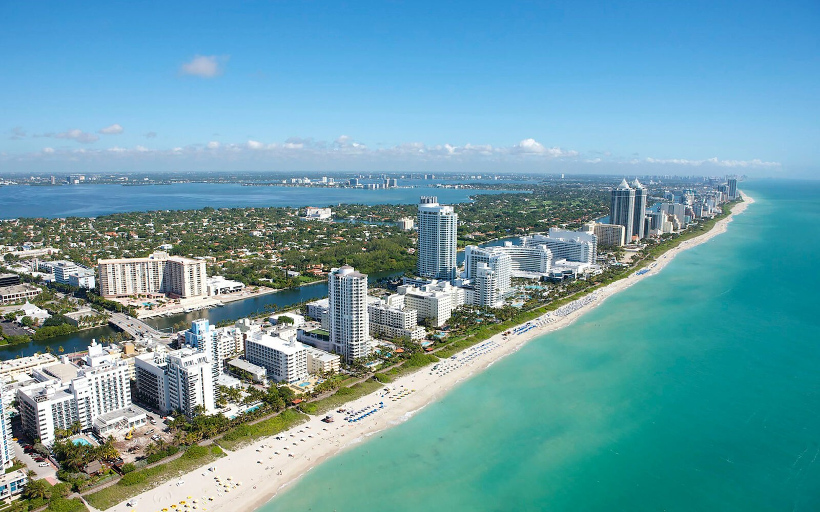 bg-miami2 CloudMasonry - Florida Based Salesforce Consulting - Miami Office Landing Page Image - Aerial view of Miami Beach skyline and ocean.